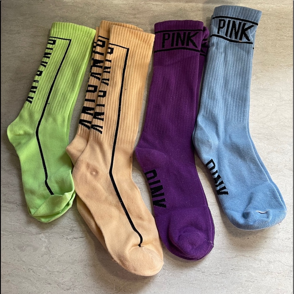 NWOT. 4 Pairs socks. You will get all 4 colors